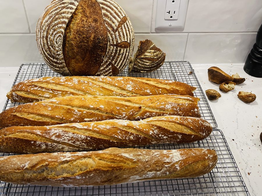A spread of fresh breads and bakes